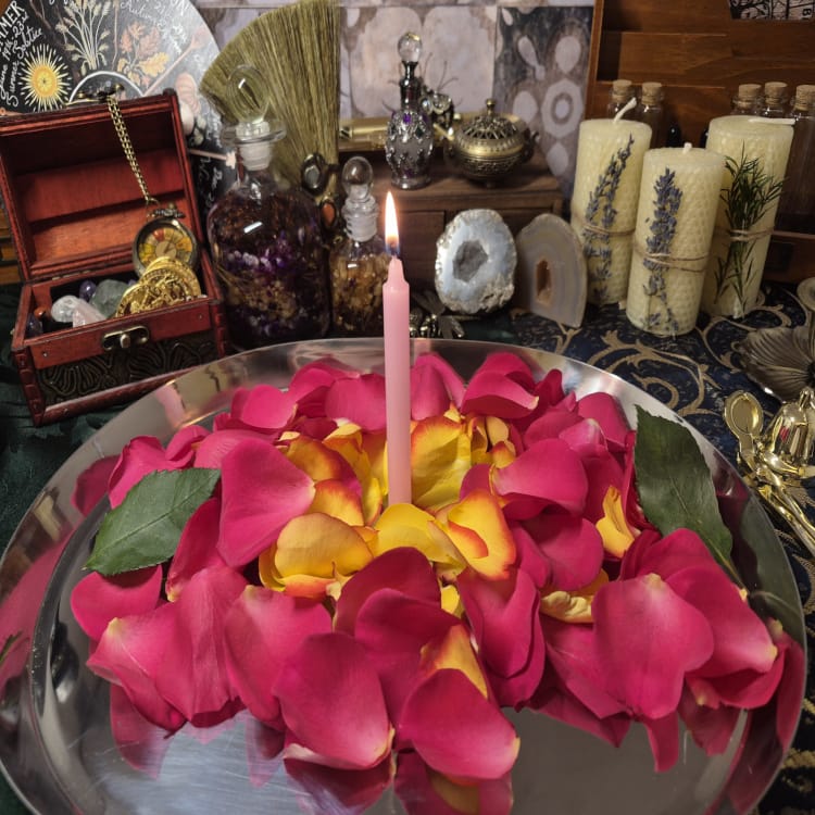 Love ritual candle with rose petals for manifestation